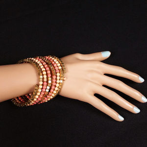 Mixed Bead Coil Bracelet Peach Gold Tone Stretch